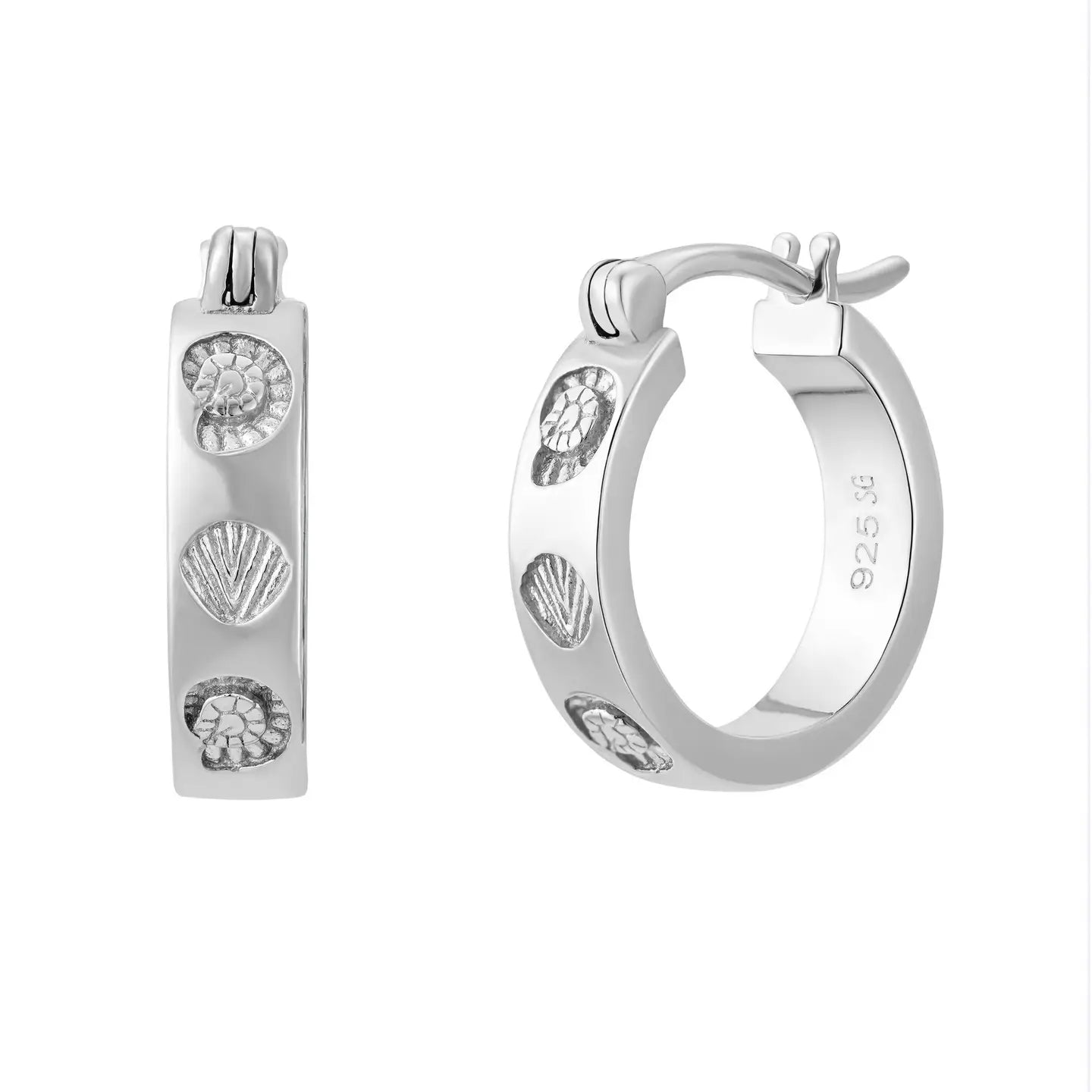 Silver hoop earrings with shell designs on a white background
