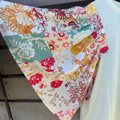 Colorful floral fabric on a wooden surface