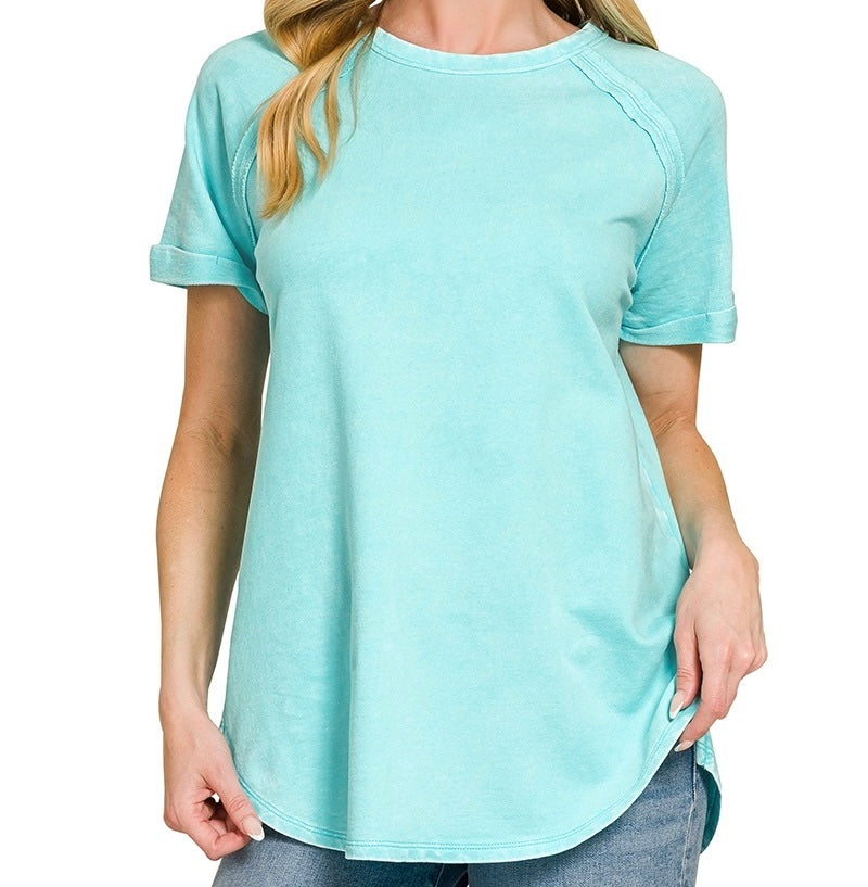 Light blue t-shirt worn by a person on a white background