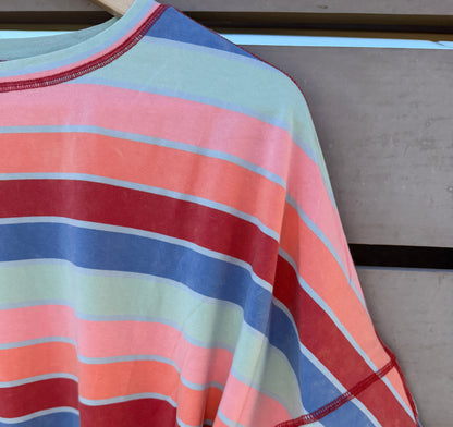 Colorful striped shirt draped over a surface
