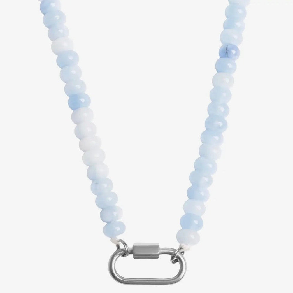 Necklace with light blue and white beaded chain and silver clasp on a white background