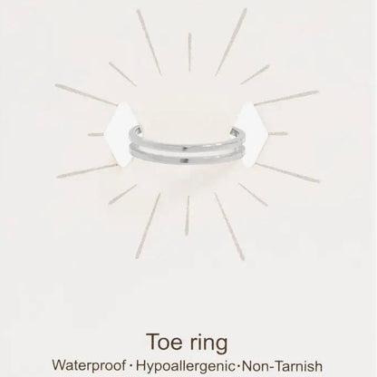 Silver toe ring on a white card