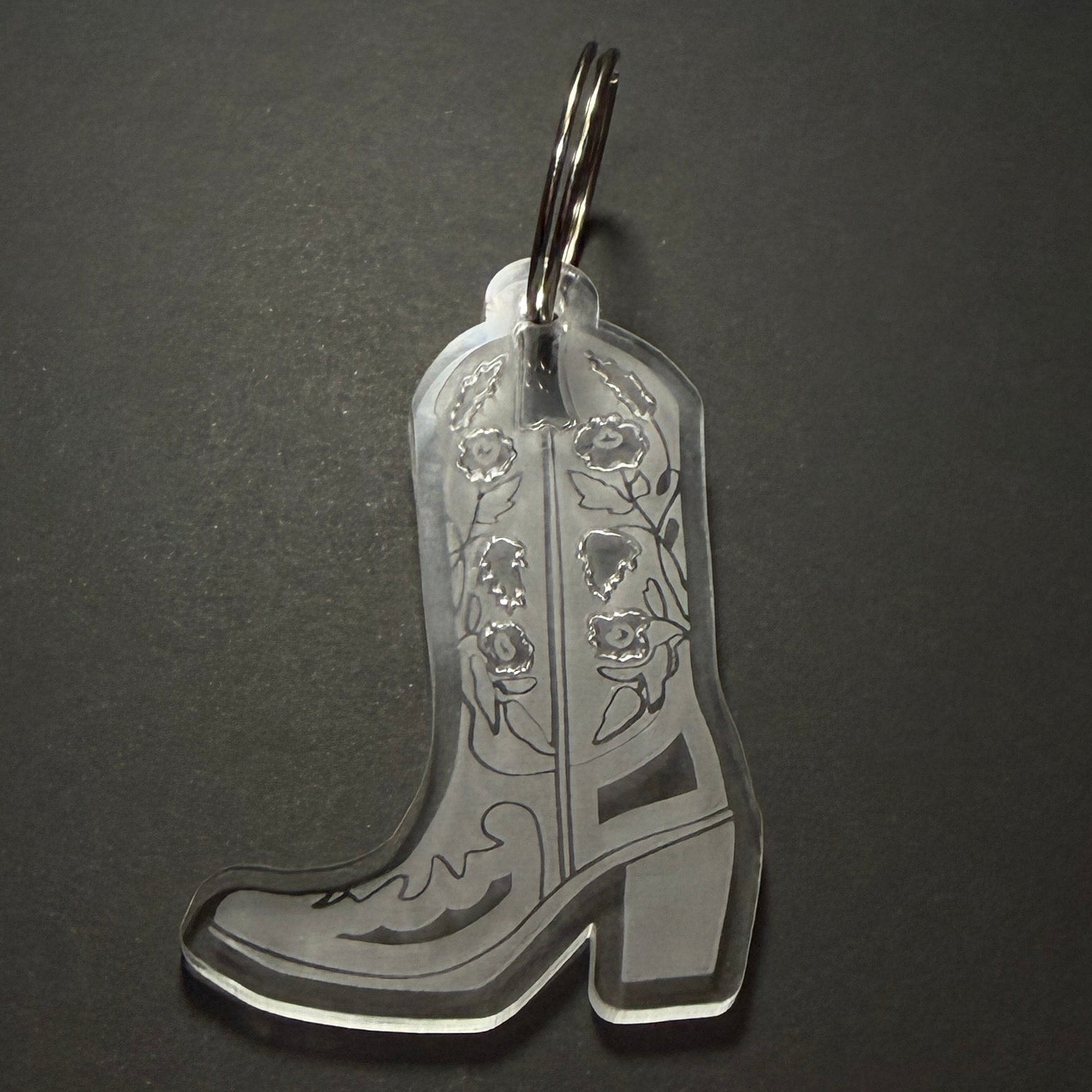 Decorative keychain on a dark surface