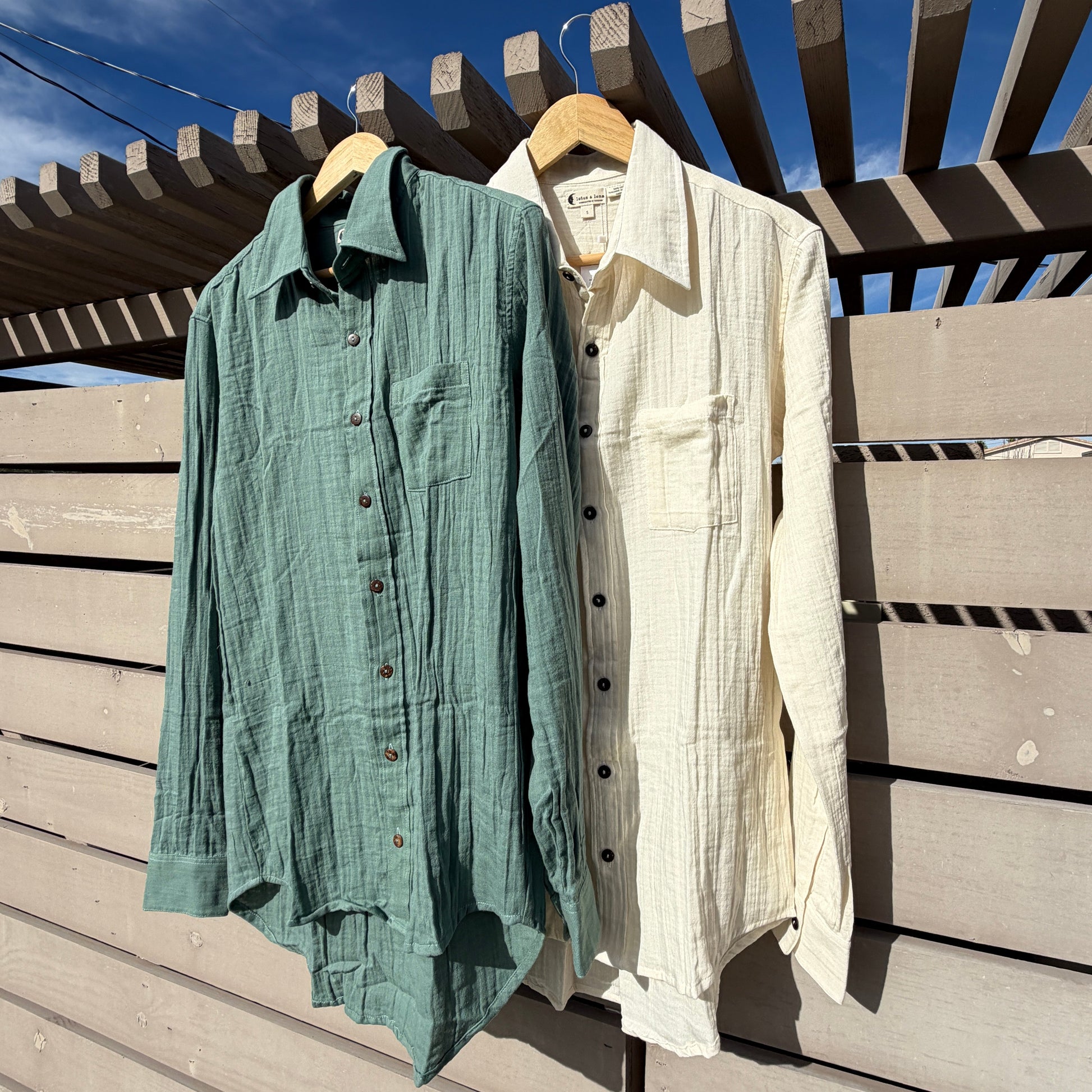 Two shirts, one white and one green