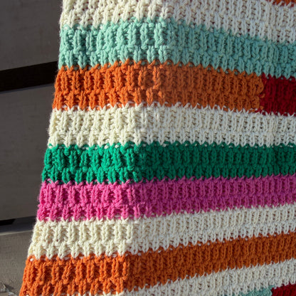 Multicolored striped fabric with a textured pattern