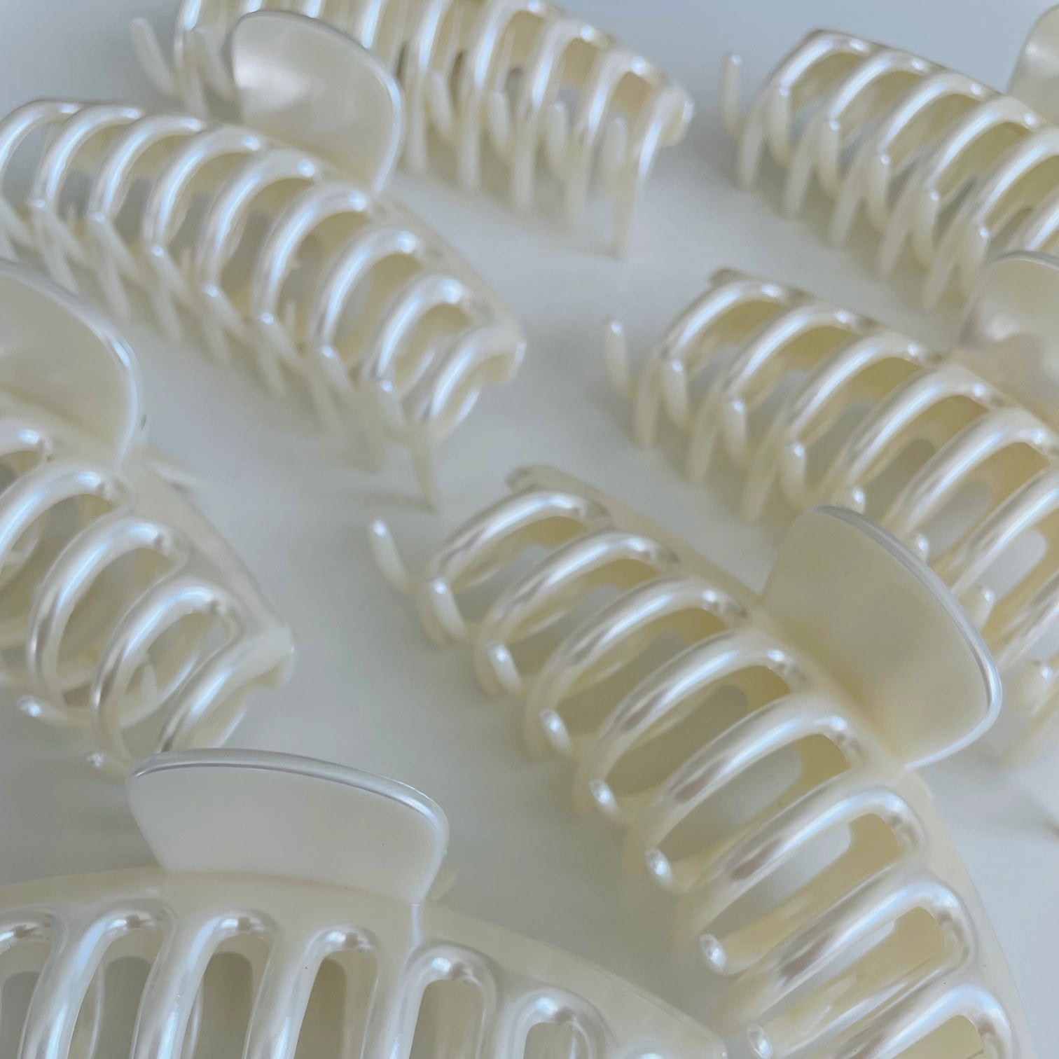 Plastic hair claw clips on a white background