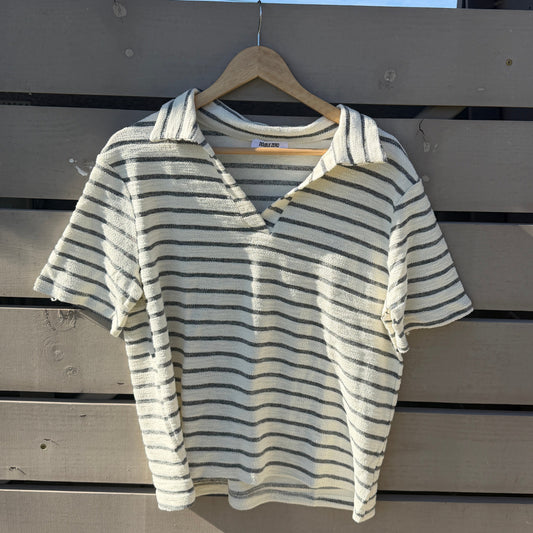 Striped shirt on a wooden surface