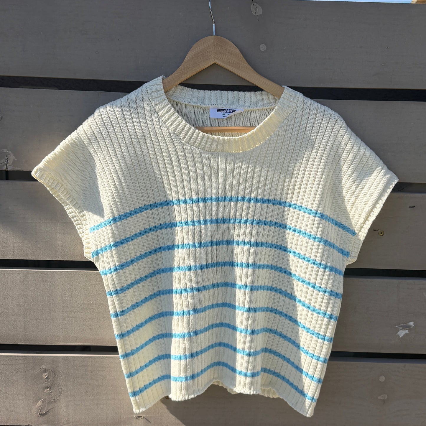 Striped shirt on a wooden surface