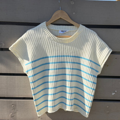 Striped shirt on a wooden surface