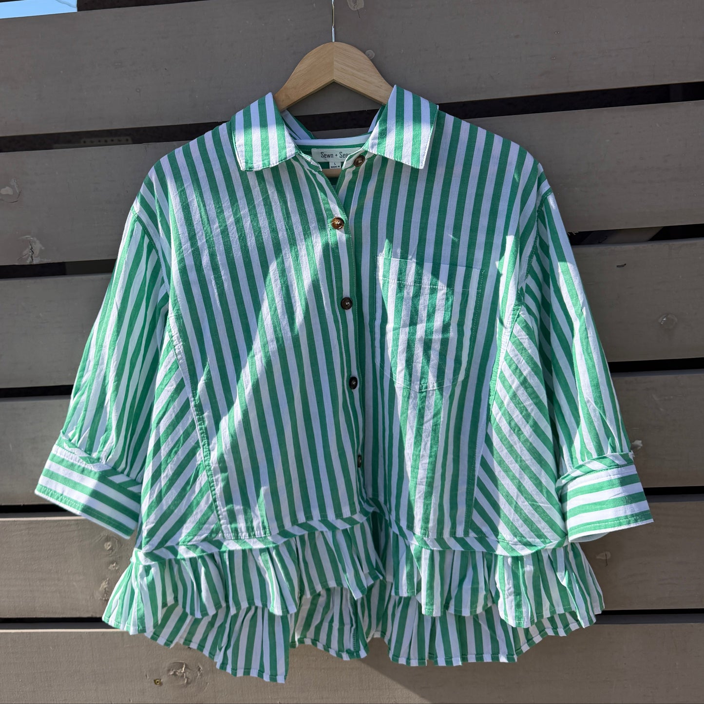 Green and white striped shirt