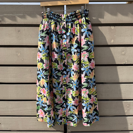 Floral-patterned fabric on a wooden surface