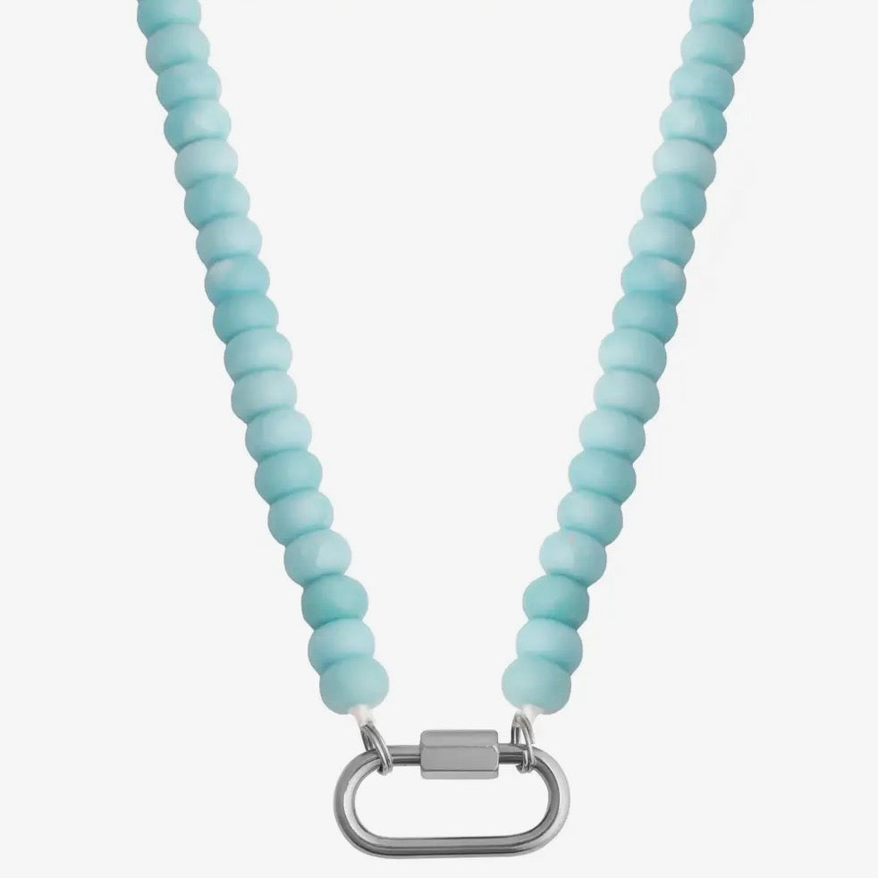 Light blue beaded necklace with a silver clasp on a white background