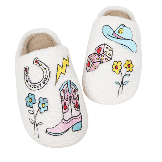 Pair of white slippers with colorful designs on a white background